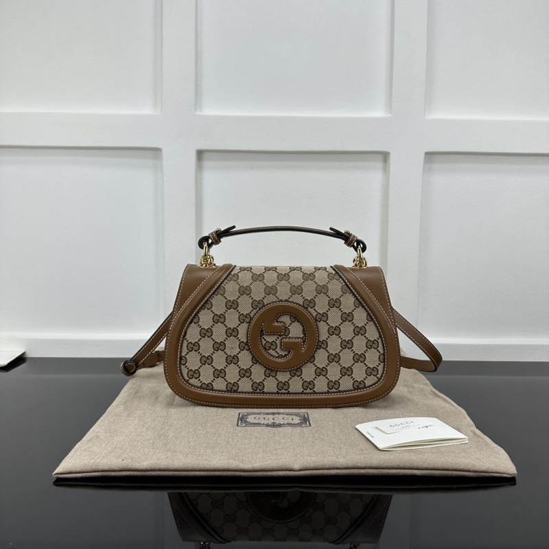 G*u*i top handle bags